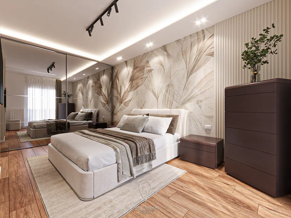 Camera matrimoniale con parquet, carta da parati botanica e panca ai piedi del letto