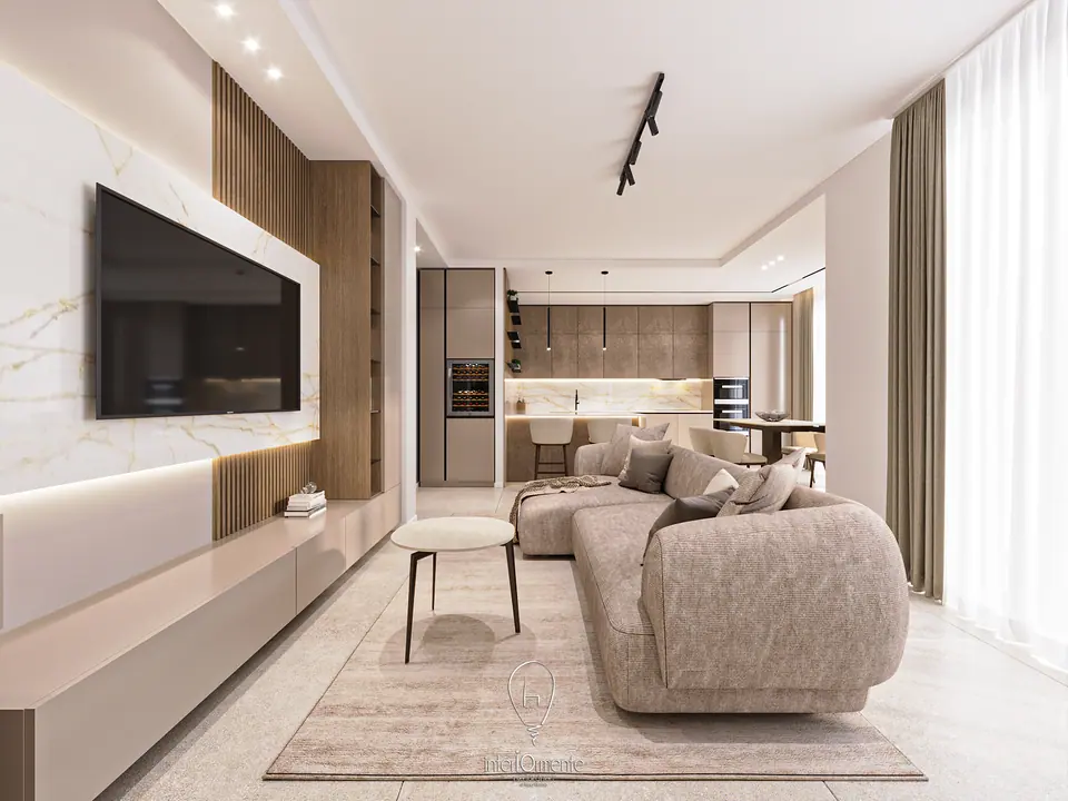 Open space con cucina in legno, isola e zona relax con divano